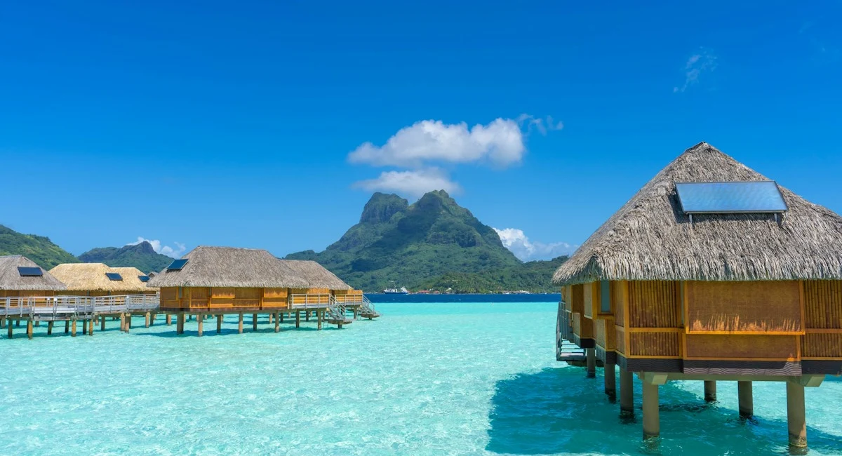 Overwater bungalows and a bright turquoise lagoon in Bora Bora