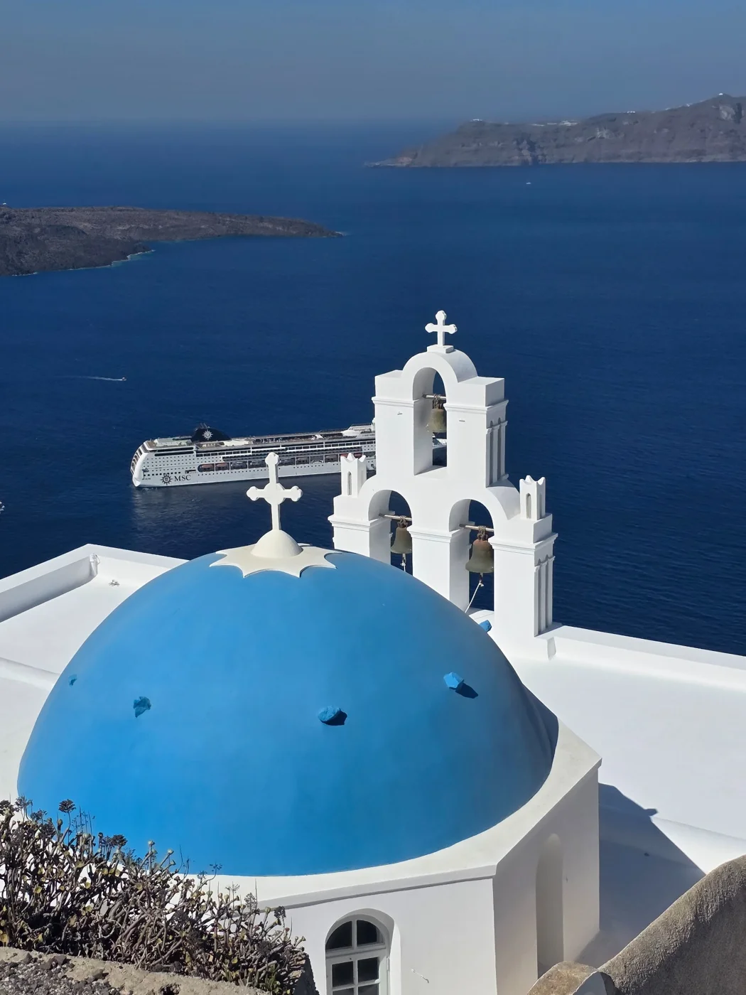 Terri’s own photo of Santorini’s blue domes and sea views